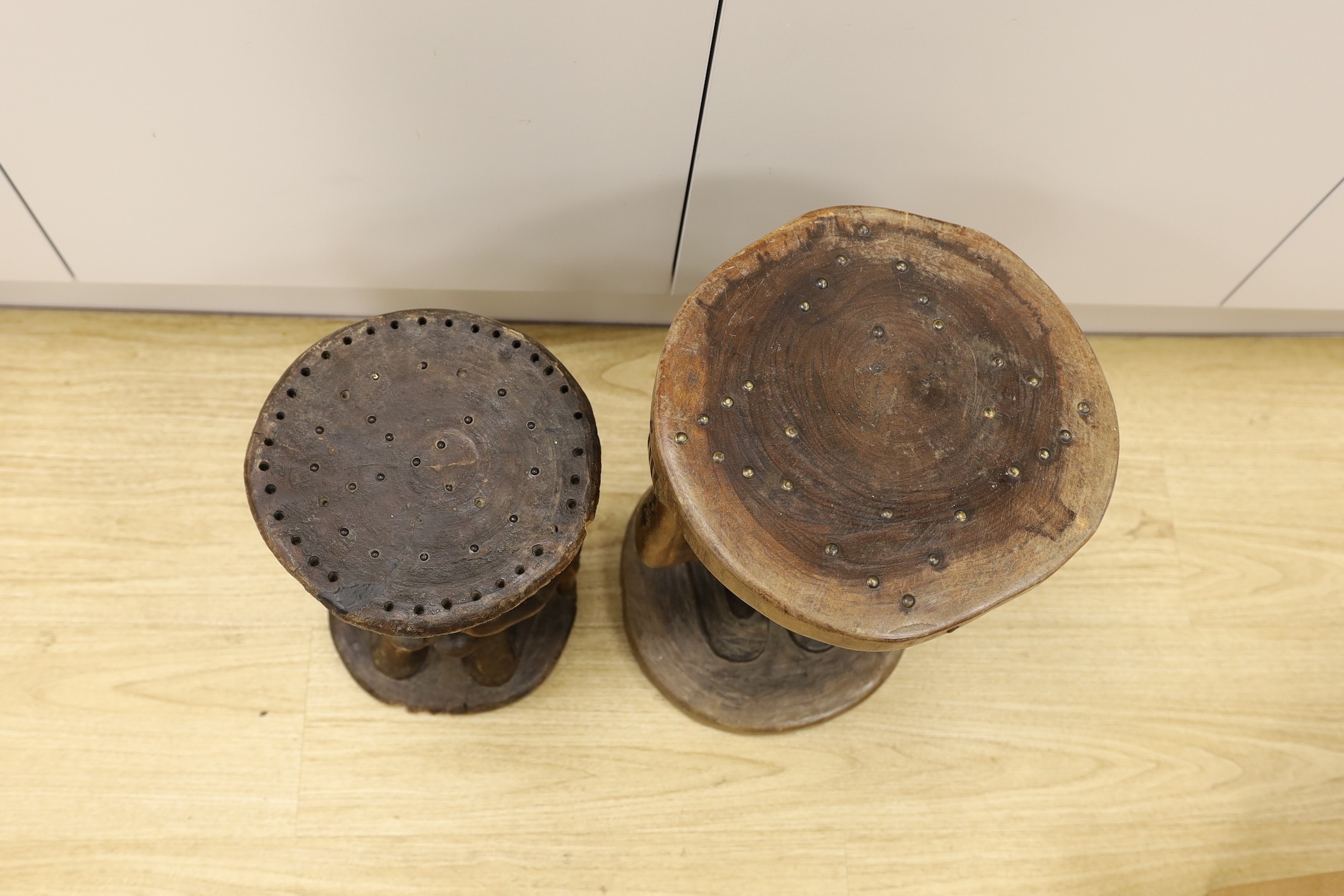 Two Songye (African) tribal stools, carved from the solid, tallest 42cm